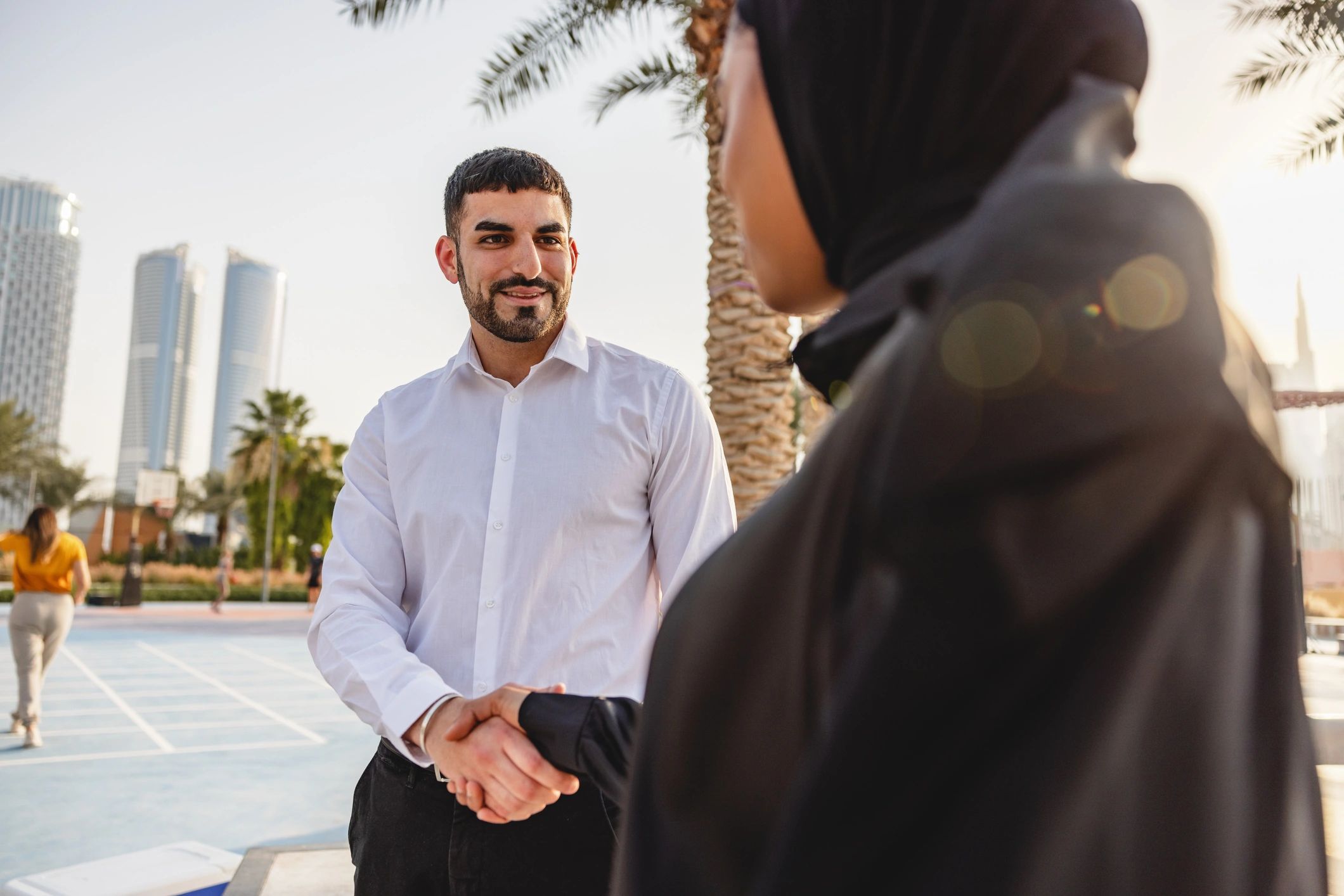 Handshake representing a successful property transaction