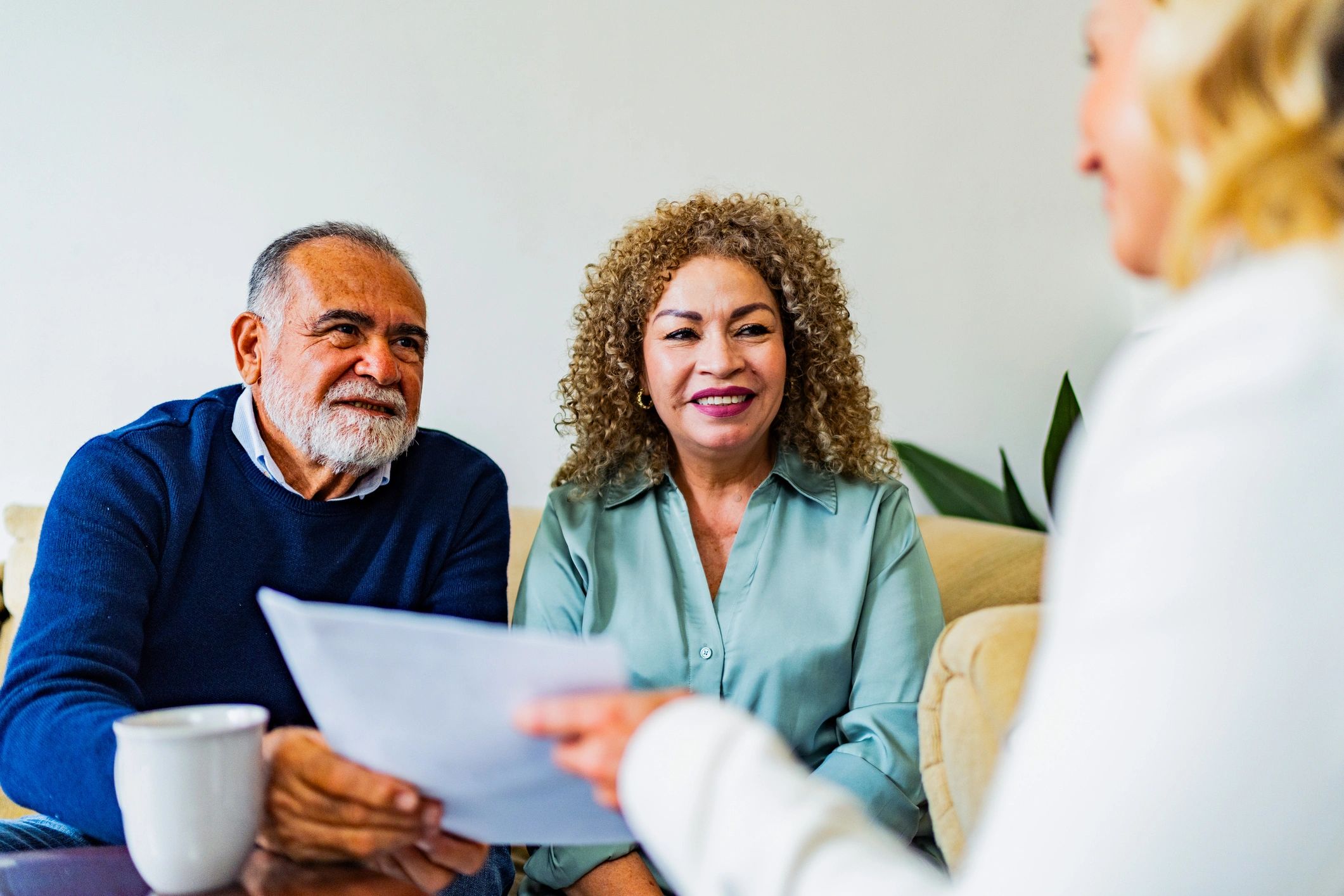 Clients meeting with an advisor at home